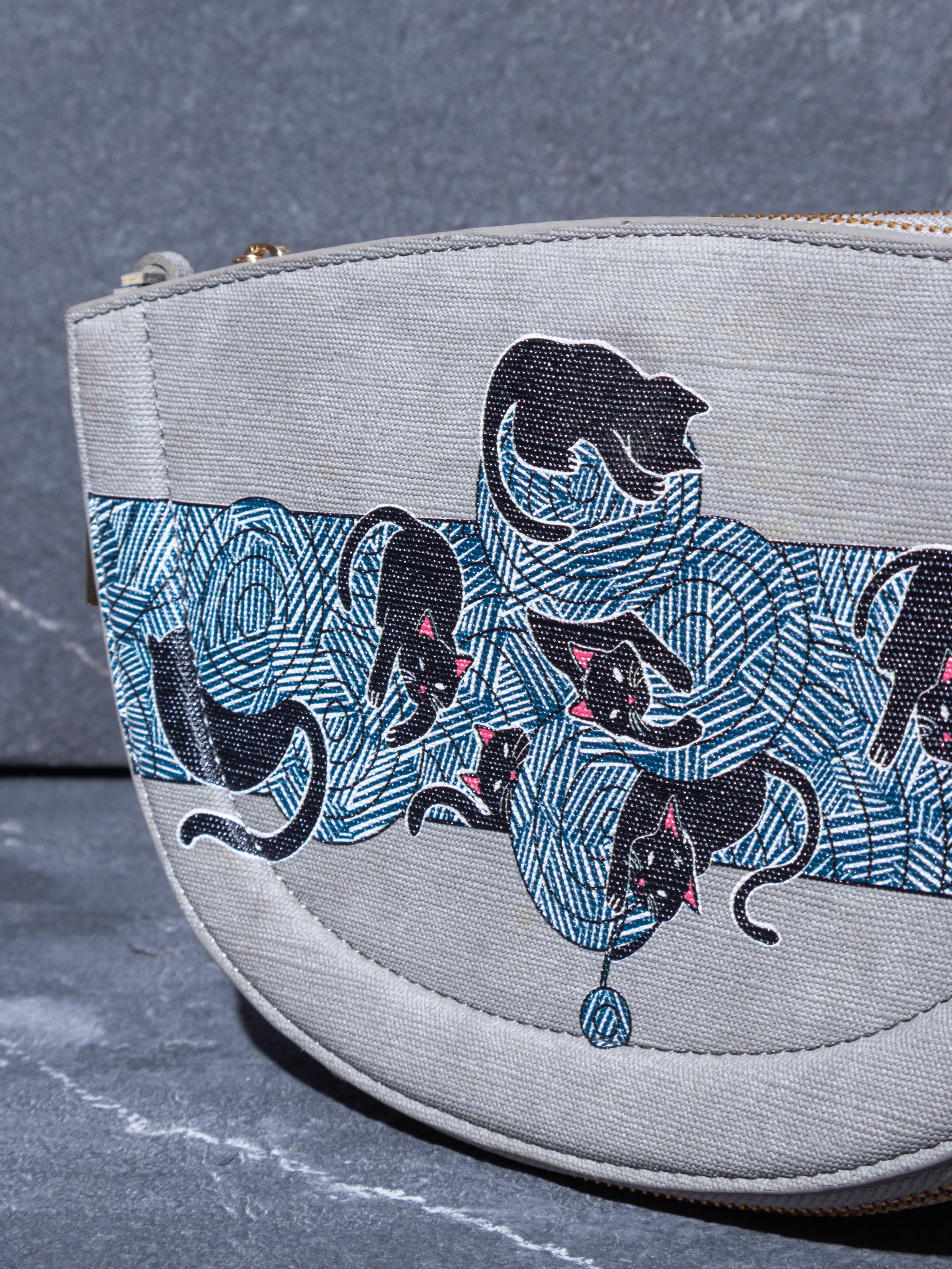 The Knitty Kitties Half Moon Sling Bag