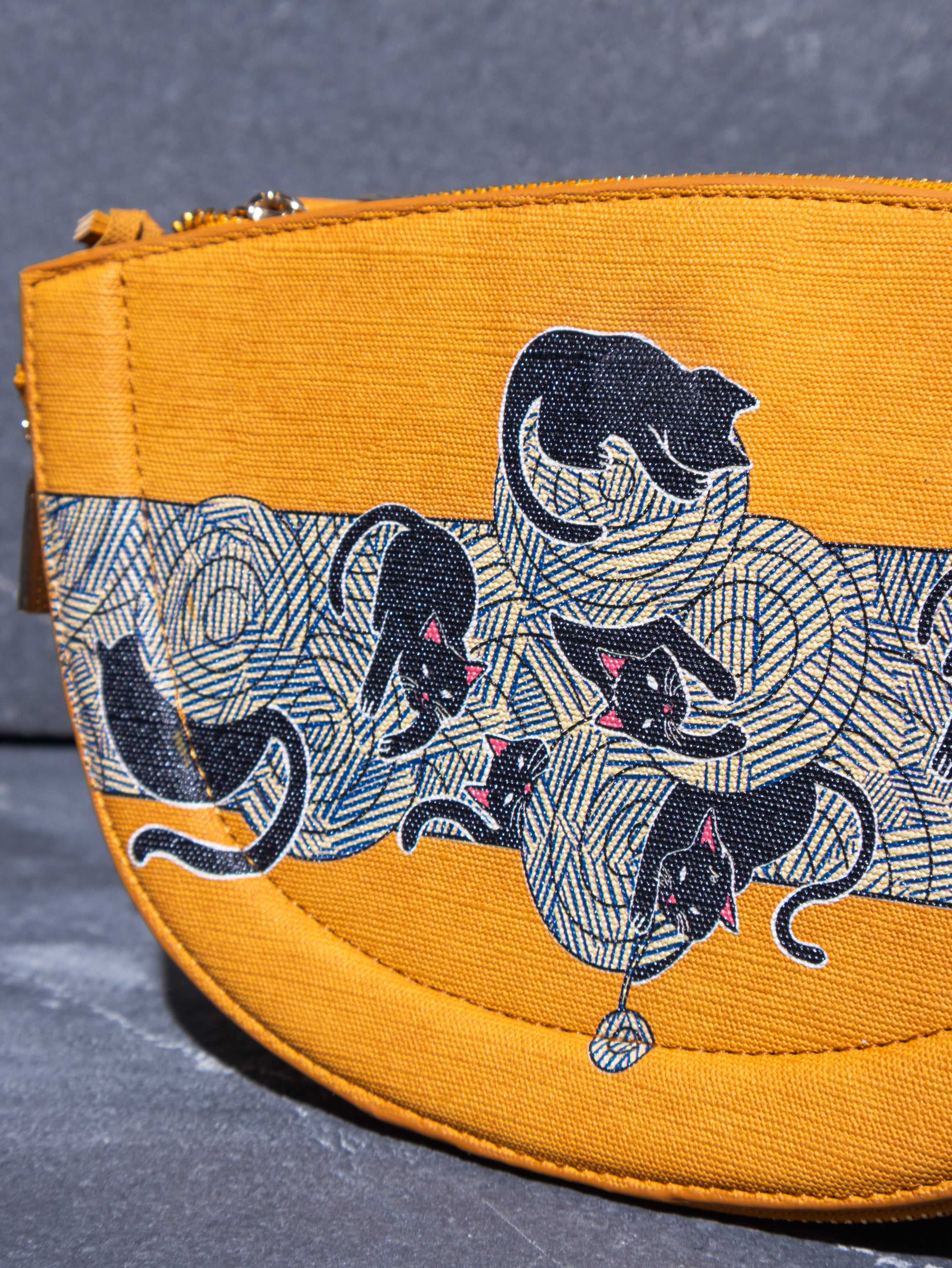 The Knitty Kitties Half Moon Sling Bag