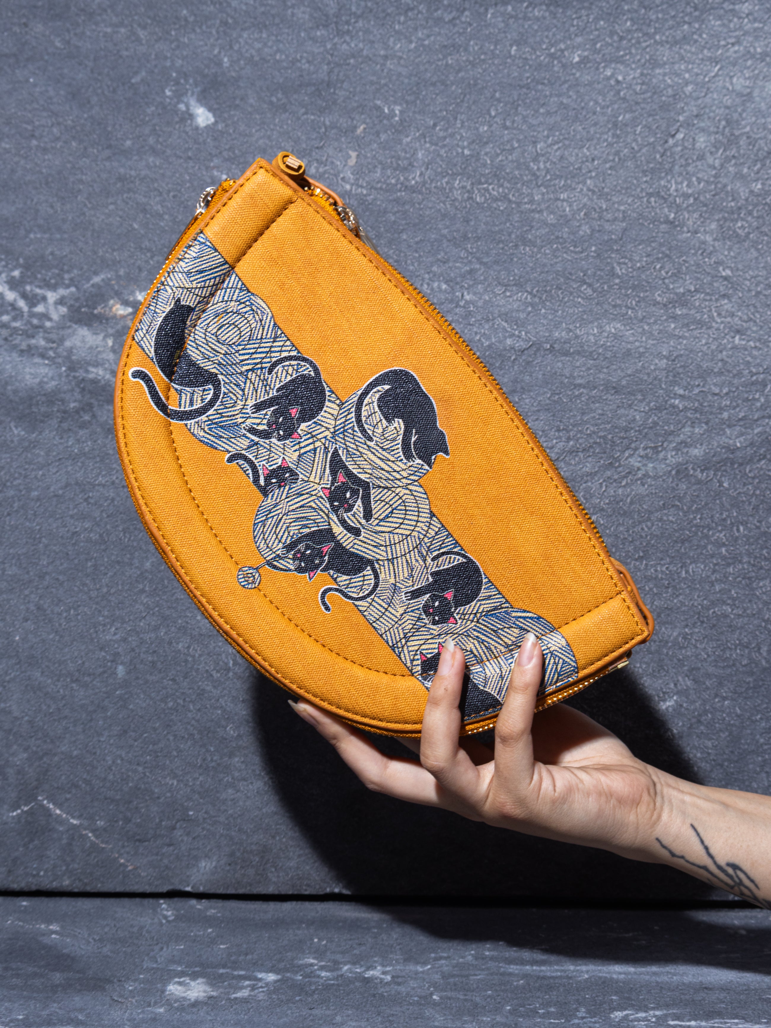 The Knitty Kitties Half Moon Sling Bag