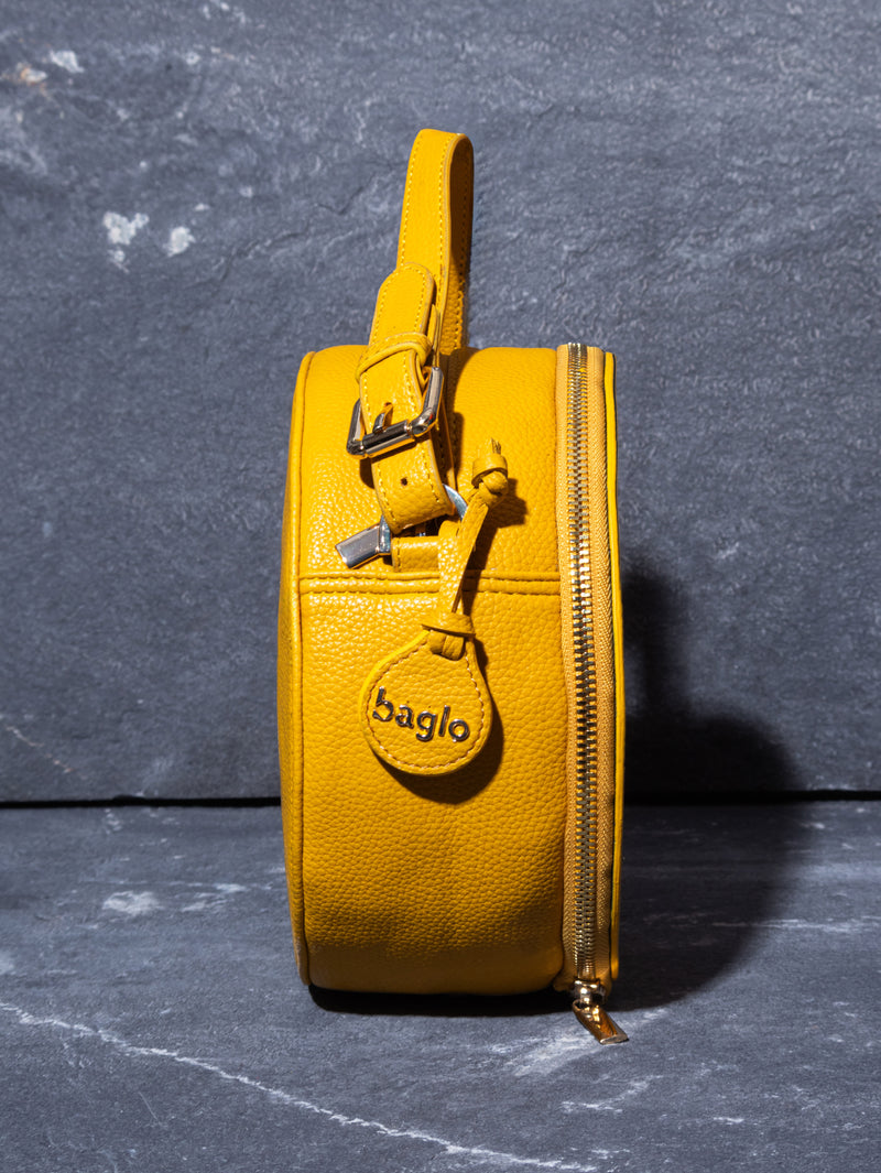 The Bahuhasta Round Sling Bag