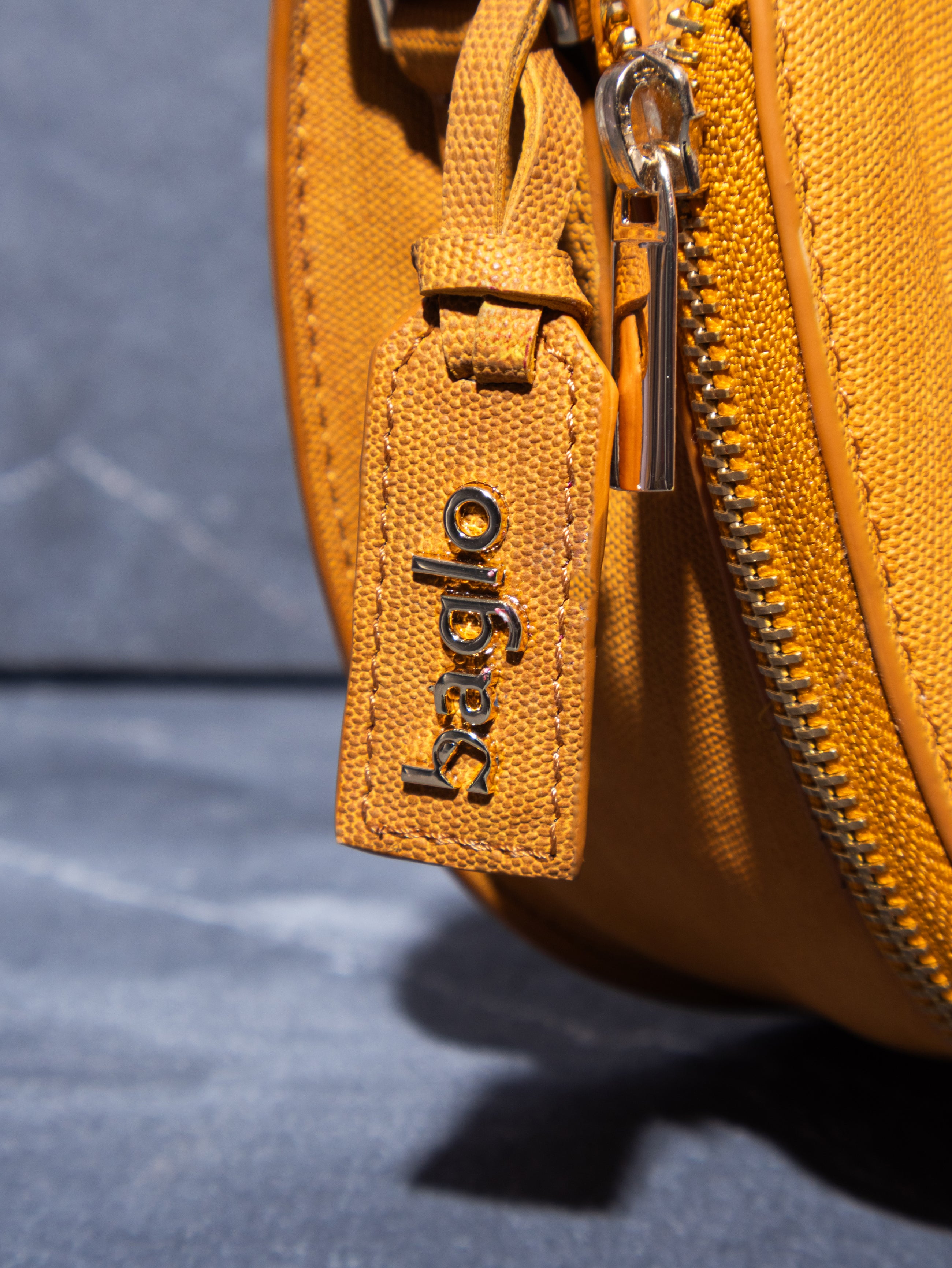 The Bagh Bahar Half Moon Sling Bag