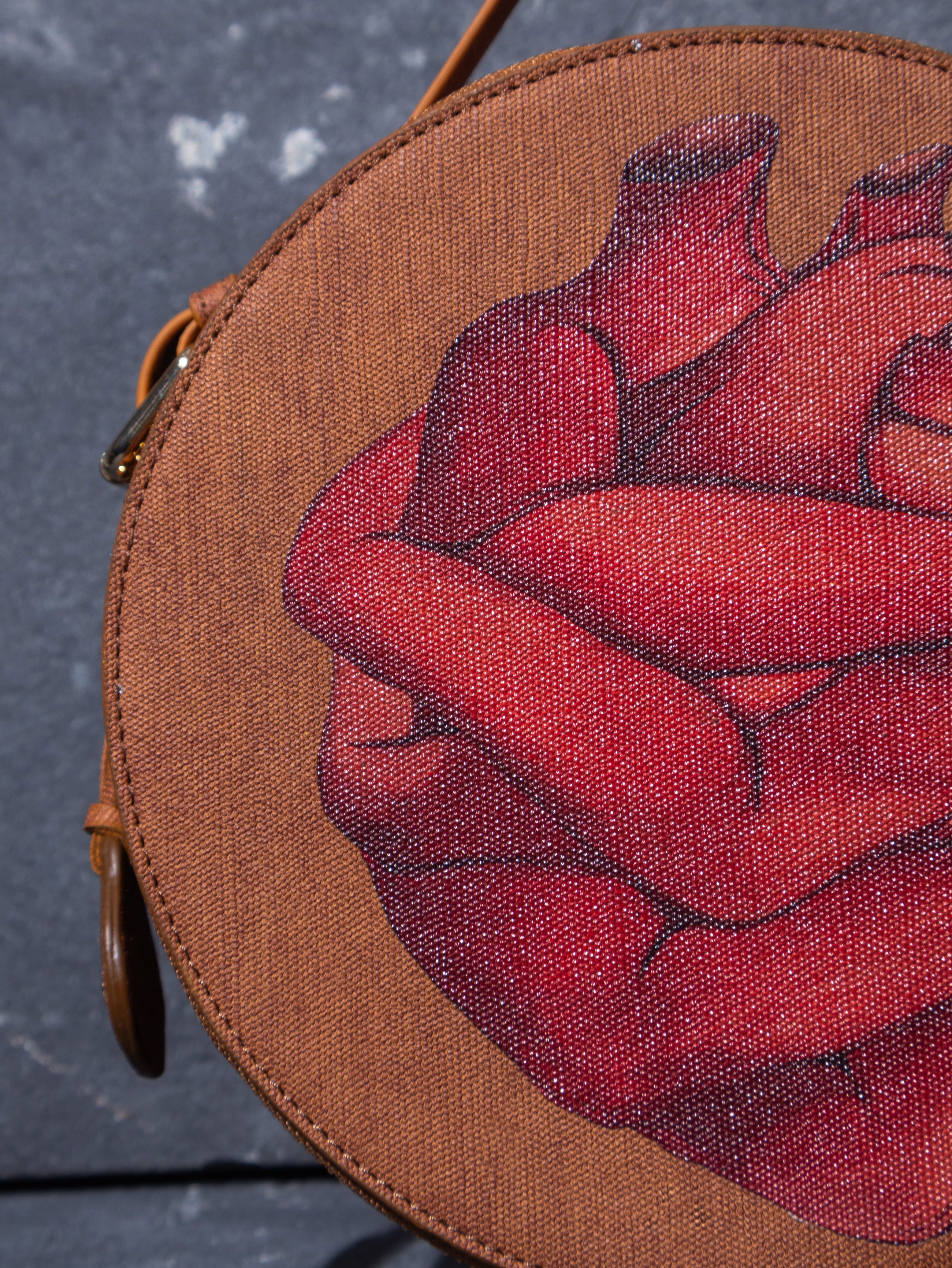 The Bahuhasta Round Sling Bag